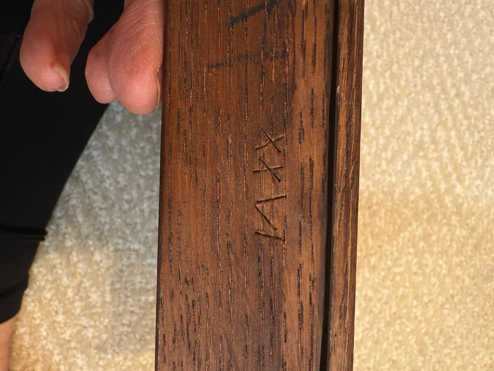 Hand-engraved XVI marking on a 1770 Louis XVI tea table from Grand Expressions Gallery and Home Store.