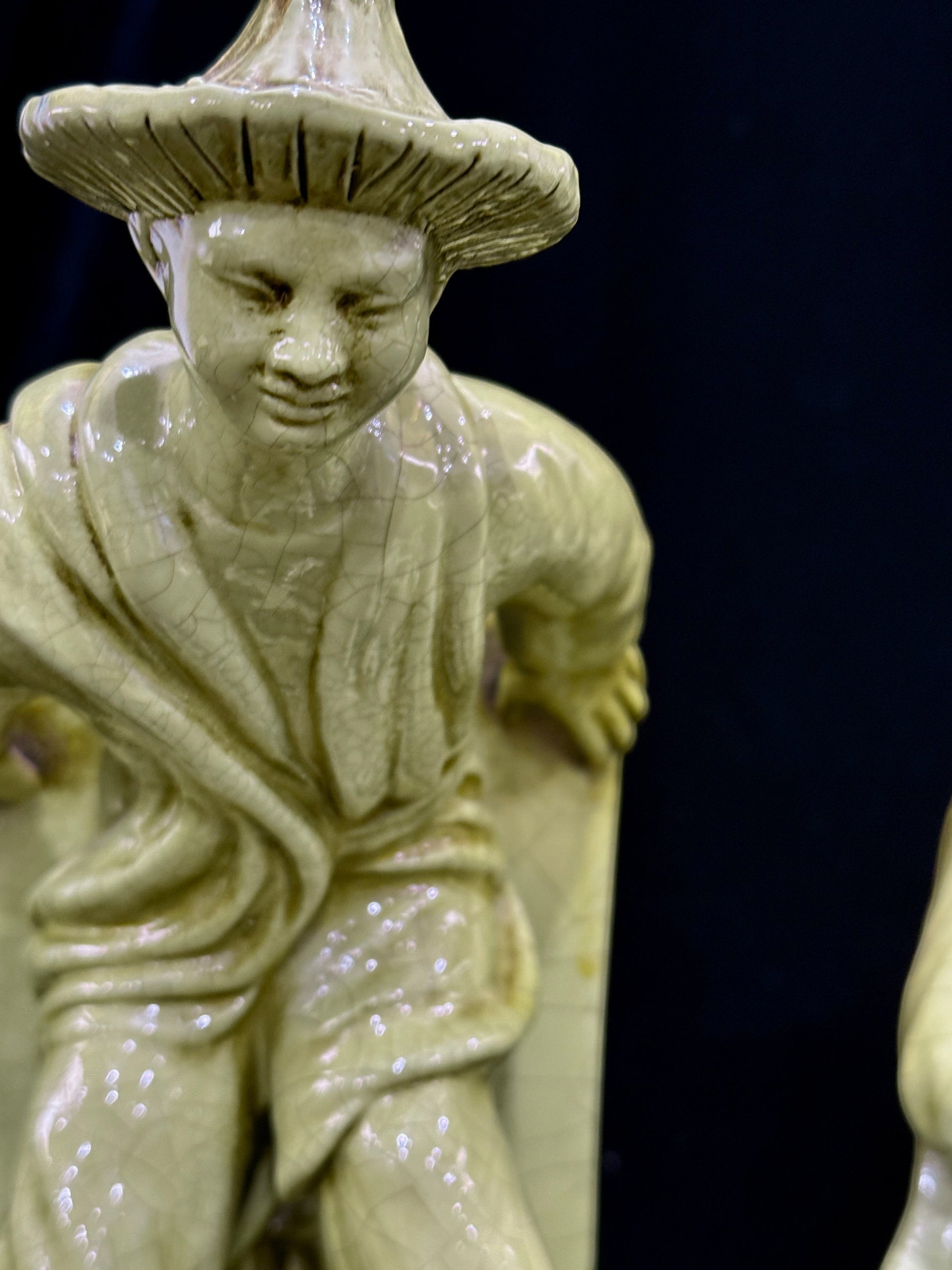 Grand Expressions Gallery and Home Store vintage Italian Asian figurine bookends with a green crackle glaze finish.