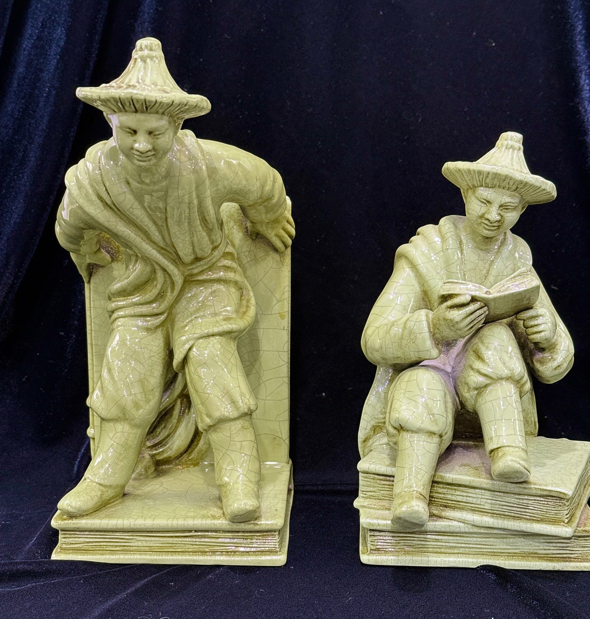 Grand Expressions Gallery and Home Store vintage Italian ceramic bookends with green crackle glaze and Asian figures.