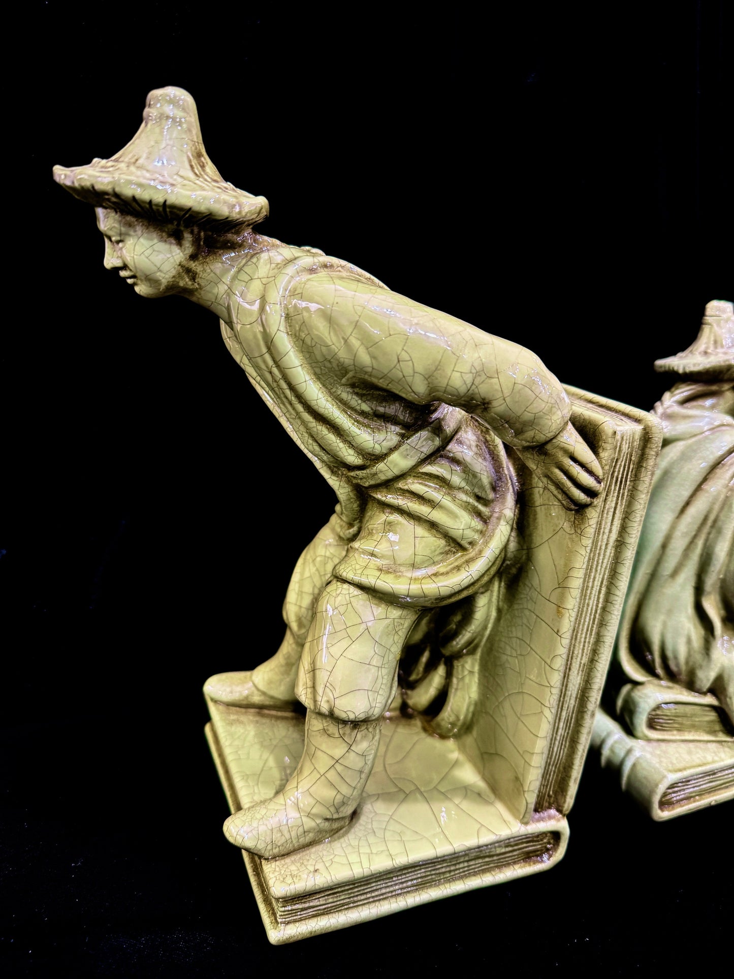 Grand Expressions Gallery and Home Store vintage Italian ceramic bookends with green crackle glaze and Asian figures.