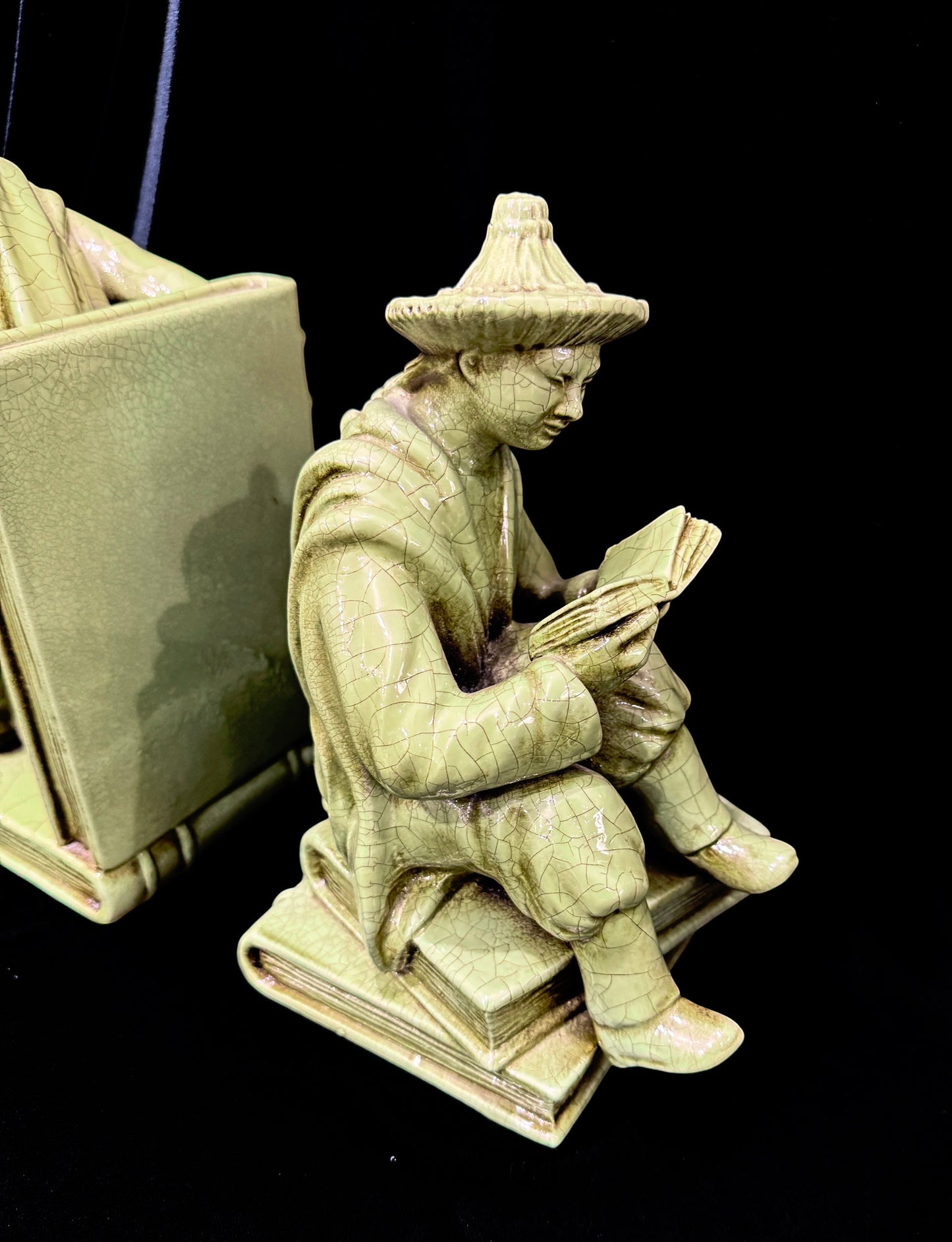 Grand Expressions Gallery and Home Store vintage Italian Asian figurine bookends with a green crackle glaze finish.