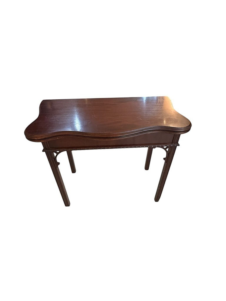 Grand Expressions Gallery and Home Store small dark wood Asian style flip-top game table with curved edges.