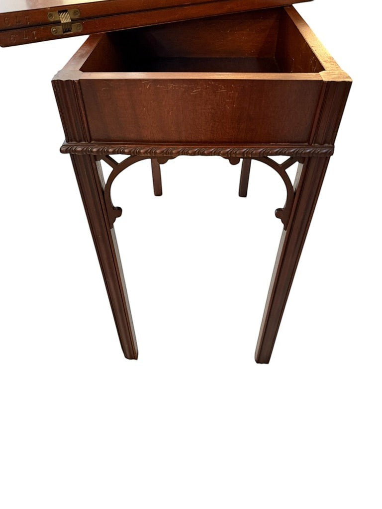 Grand Expressions Gallery and Home Store small wooden flip-top Asian style game table with decorative carved legs.