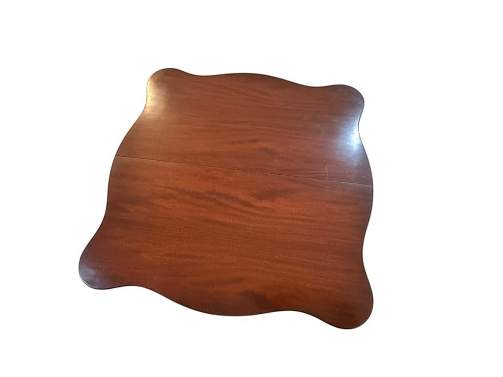 Grand Expressions Gallery and Home Store small Asian style wooden flip-top game table with a scalloped edge design.