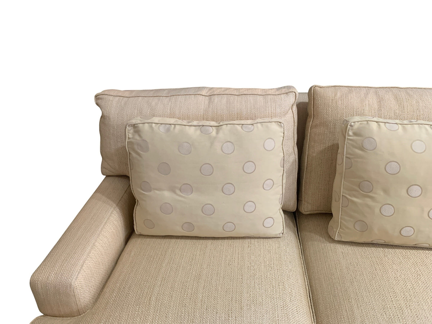 Grand Expressions Gallery and Home Store ivory Baker Loose Back sofa with textured fabric and polka dot accent pillows