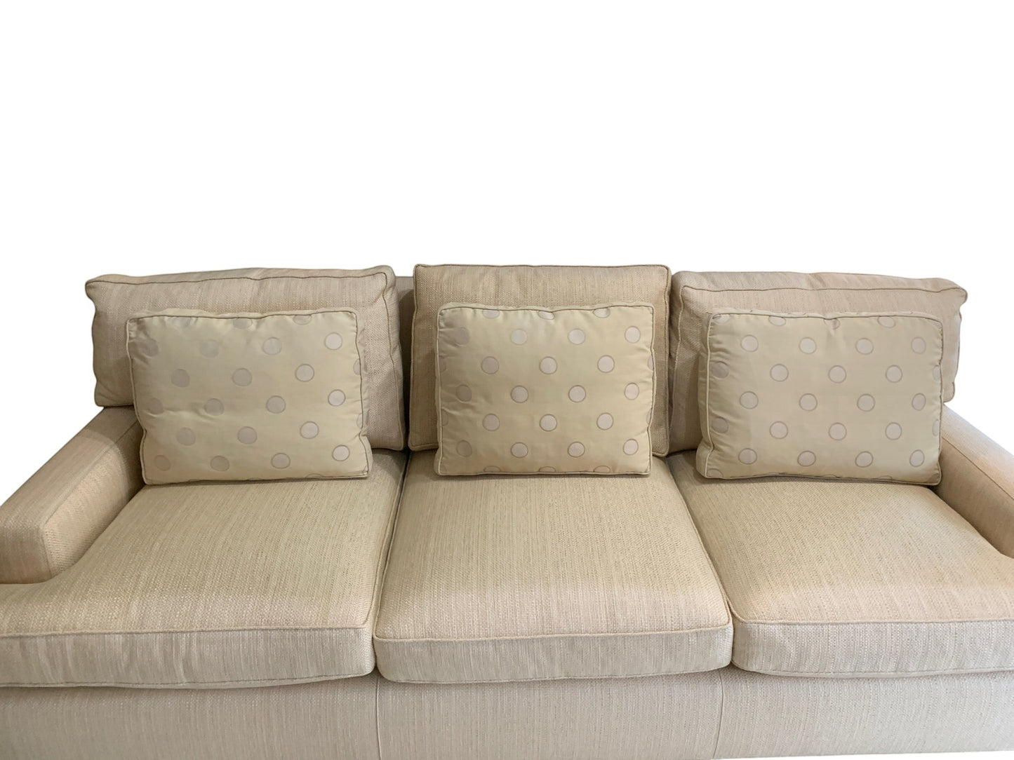 Grand Expressions Gallery and Home Store ivory Baker Loose Back sofa with polka dot accent pillows and textured fabric