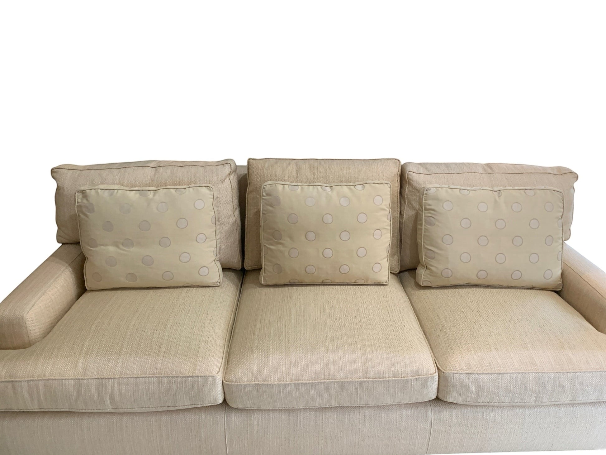 Grand Expressions Gallery and Home Store ivory Baker Loose Back sofa with polka dot accent pillows and textured fabric