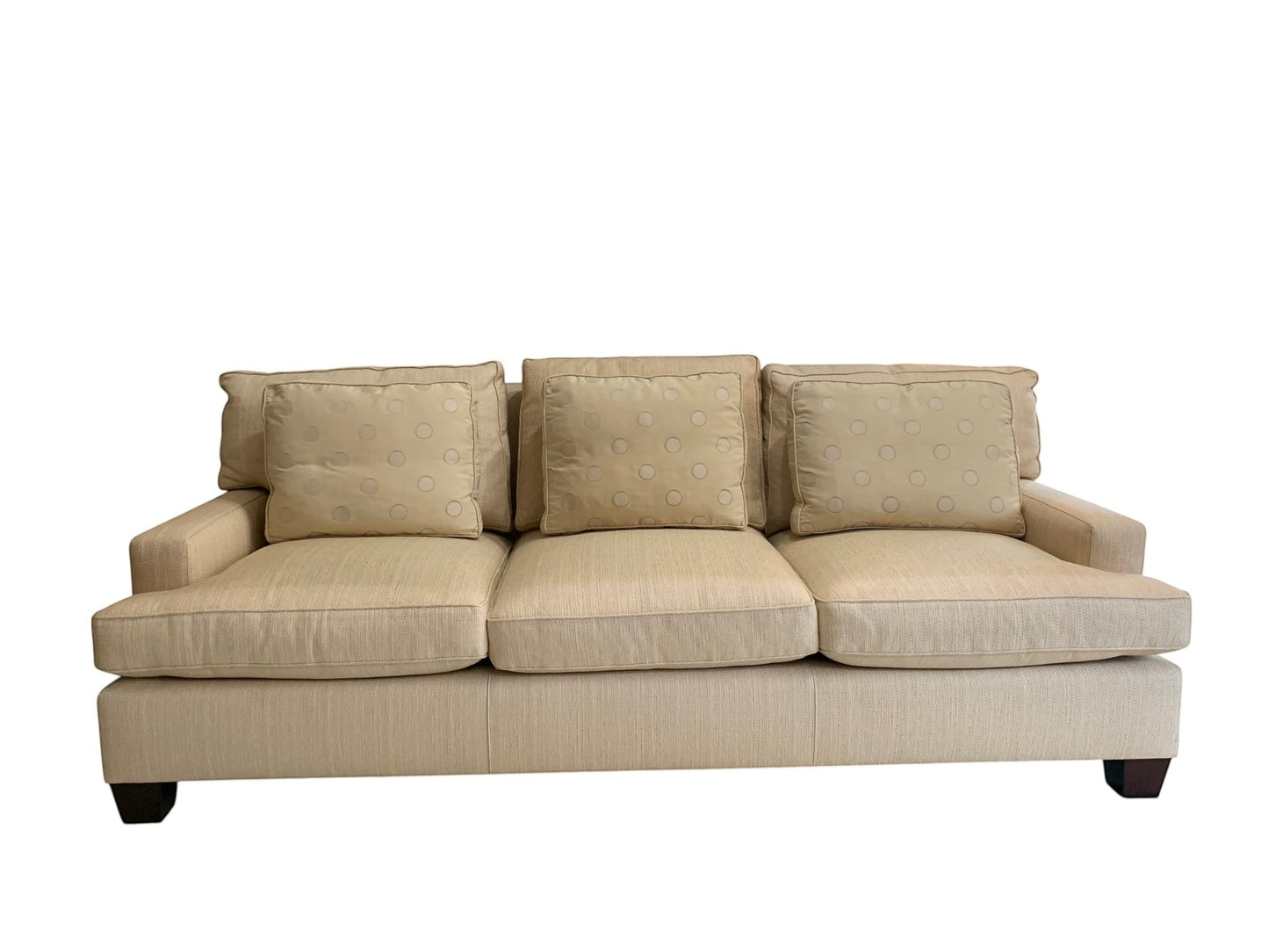 Grand Expressions Gallery and Home Store ivory Baker loose back sofa with patterned throw pillows and beech legs.