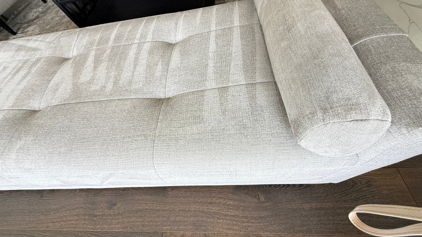 Grand Expressions Gallery and Home Store Baker Paris chaise lounge in beige fabric with modern tufted stitching.