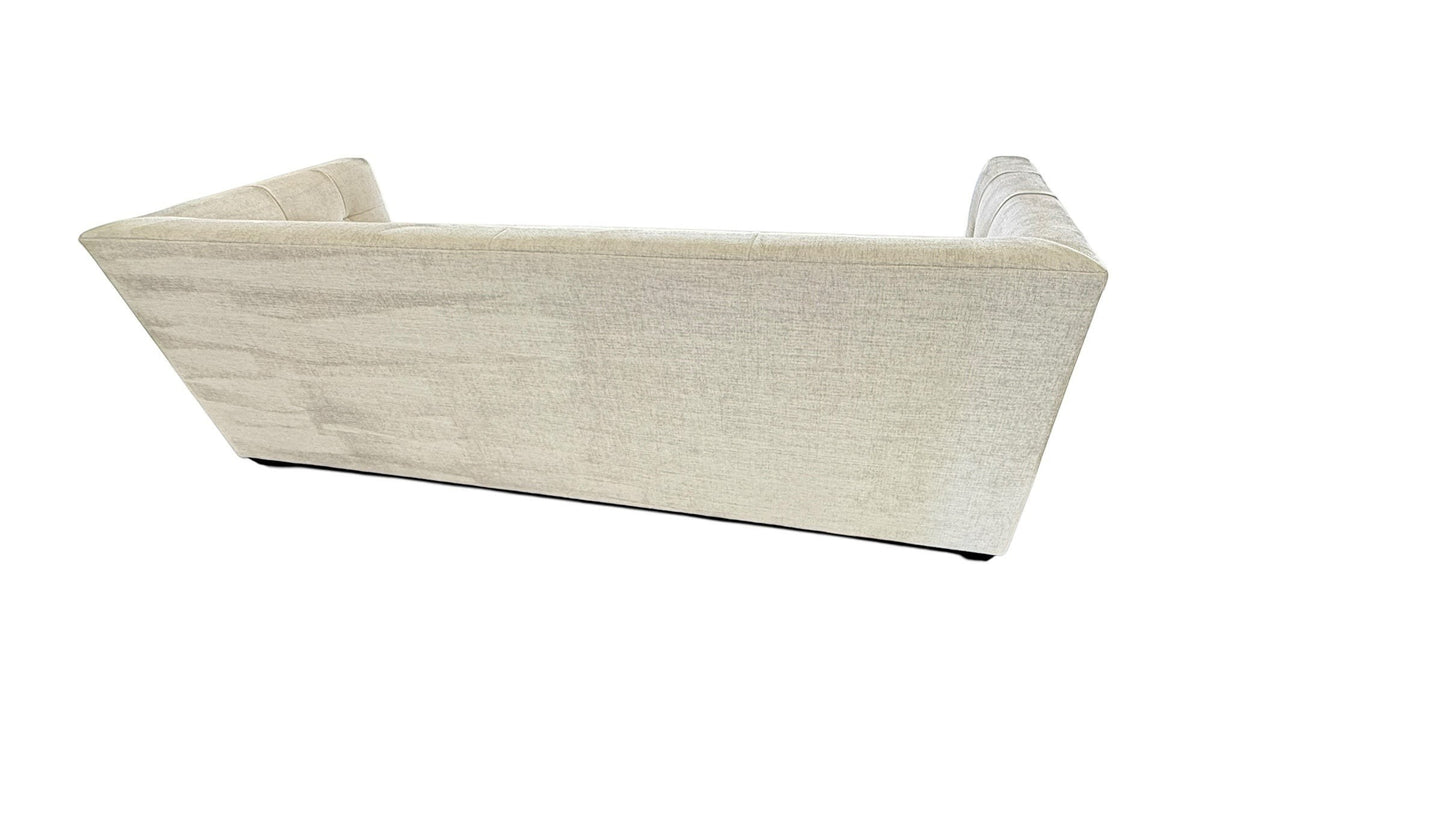 Back view of the Baker Paris Loveseat with Single Stitch in beige fabric by Grand Expressions Gallery and Home Store.