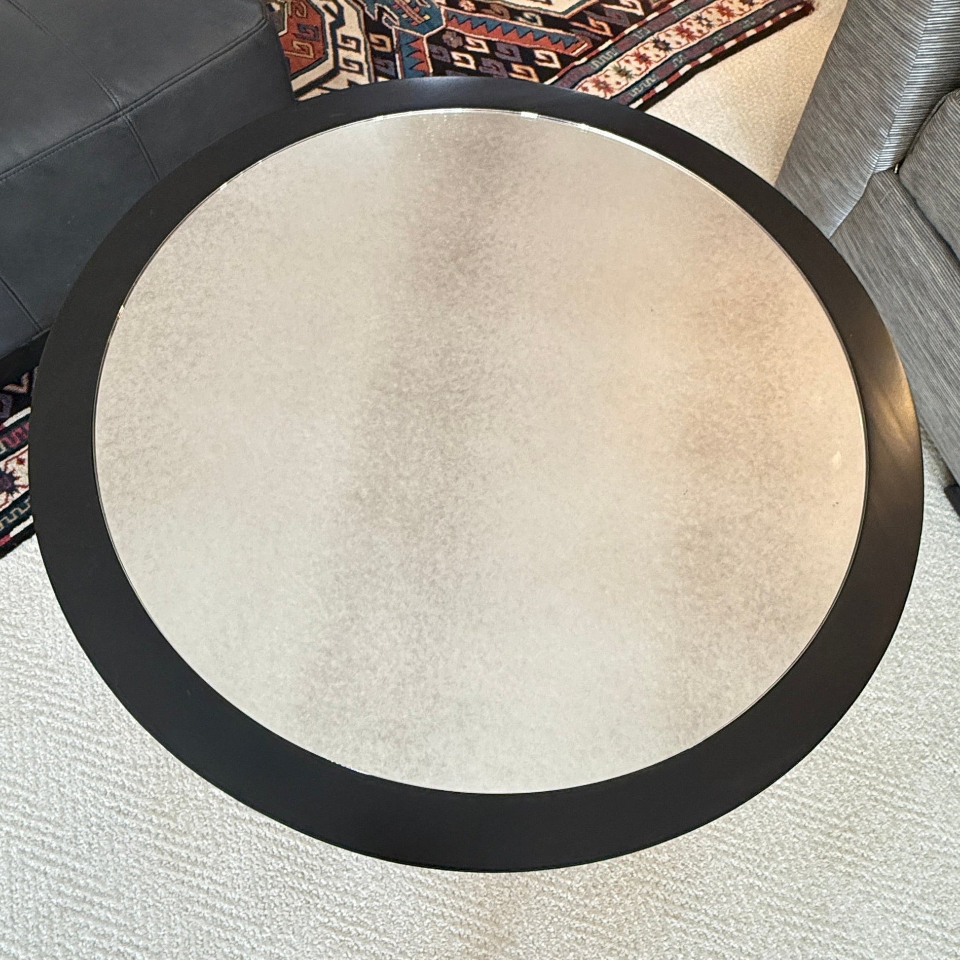 Bernhardt round accent table with a dark frame and mirrored top from Grand Expressions Gallery and Home Store.
