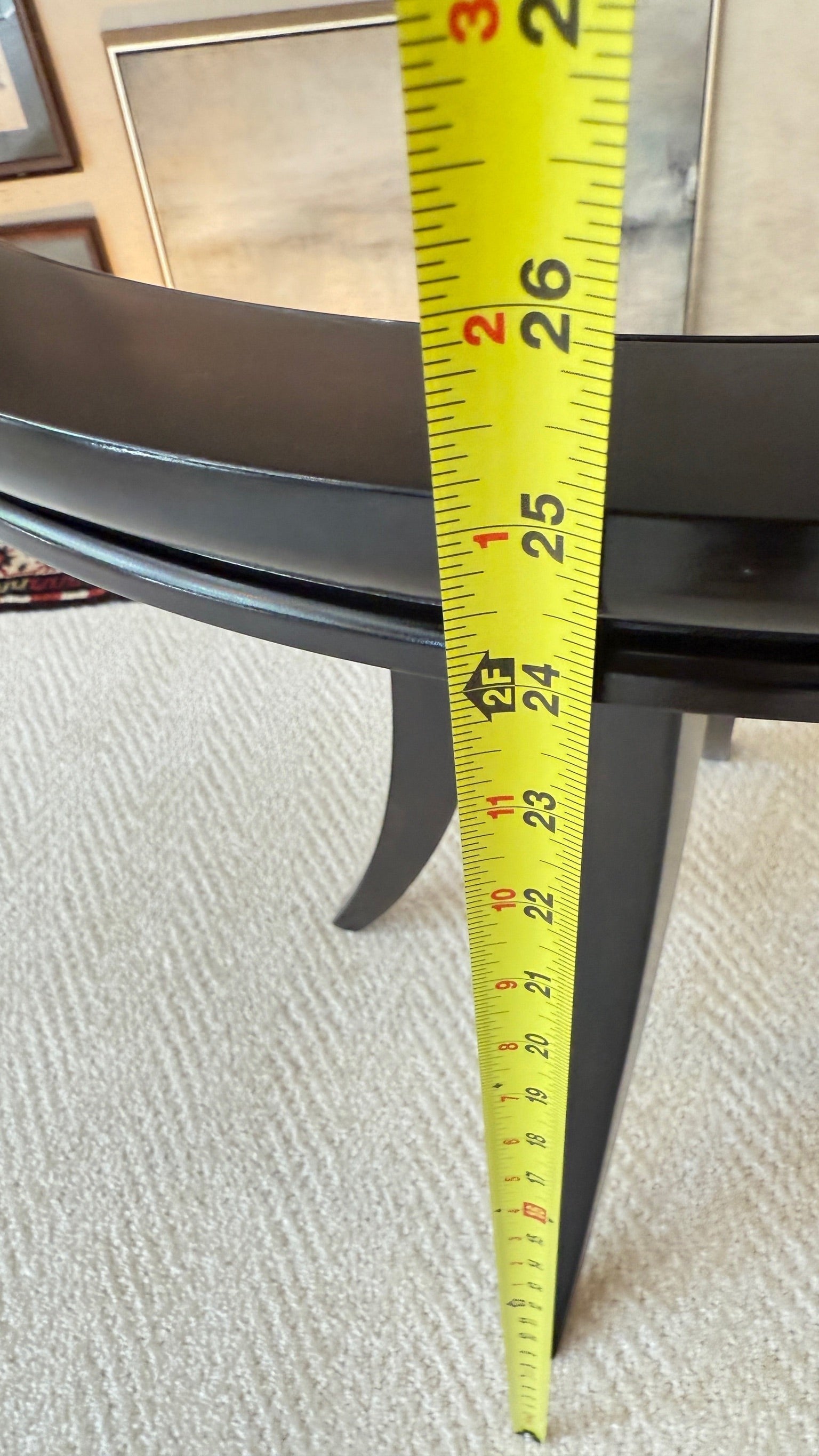 Grand Expressions Gallery and Home Store Bernhardt round dark wood accent table with a reflective mirrored top