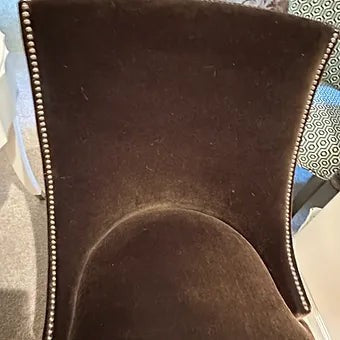 Grand Expressions Gallery and Home Store brown mohair armless chair with silver nailhead trim and white lacquer legs.
