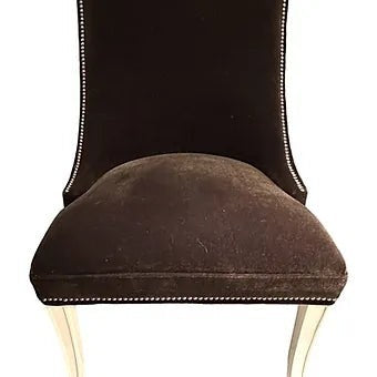 Grand Expressions Gallery and Home Store brown mohair armless chair with nailhead trim and white lacquer saber legs.
