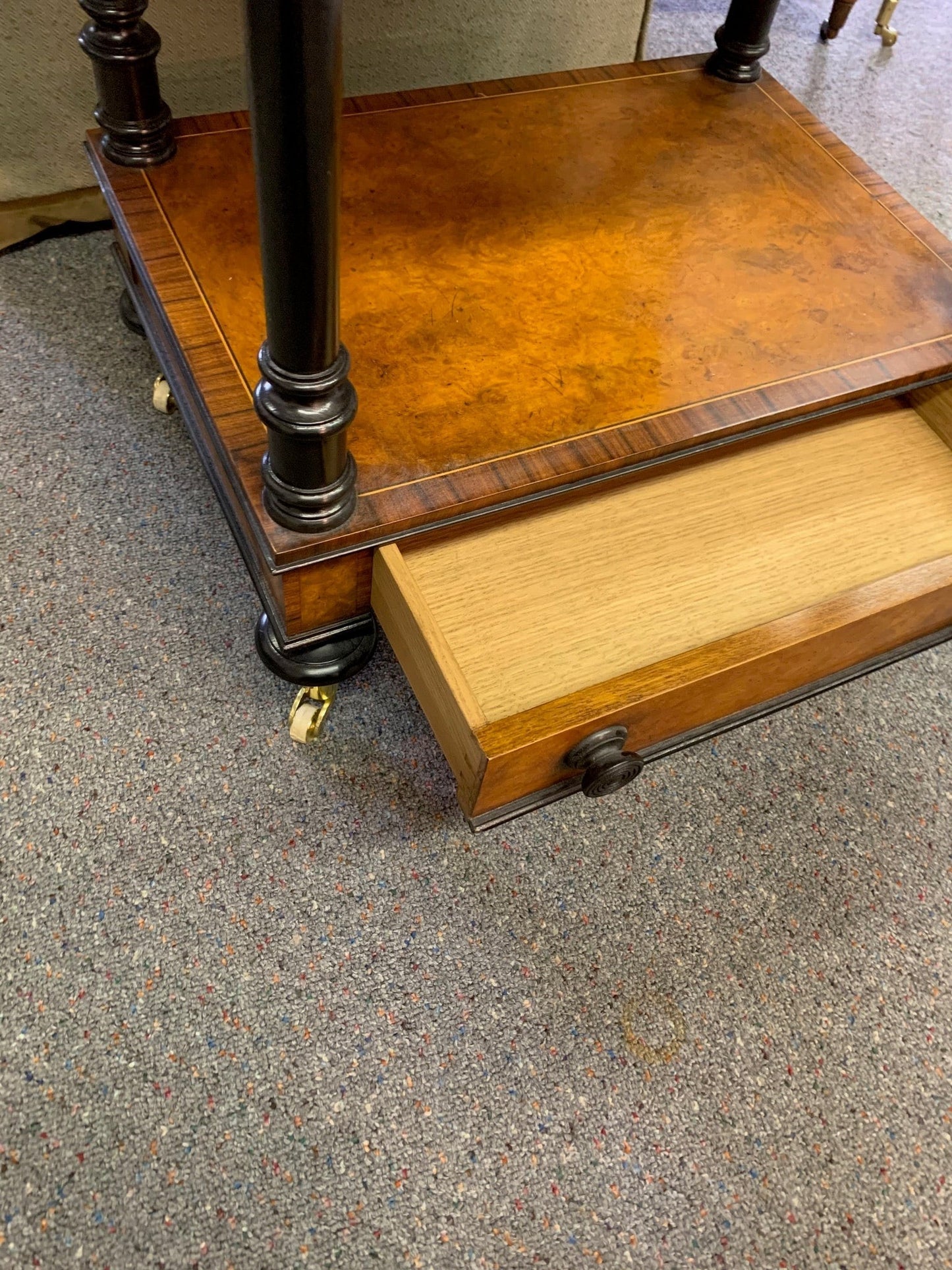 Grand Expressions Gallery and Home Store Italian burled wood triple shelf with black trim, inlay, and storage drawer.
