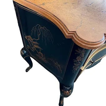 Grand Expressions Gallery and Home Store Drexel Chinoiserie small chest with black and gold hand-painted Asian scenery.