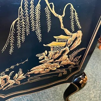 Grand Expressions Gallery and Home Store Drexel Chinoiserie chest with black and gold hand-painted Asian scenery.