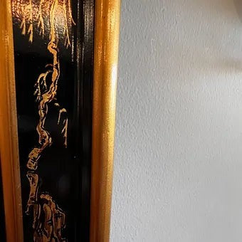 Grand Expressions Gallery and Home Store Drexel Chinoiserie chest and mirror with black and gold hand-painted detail.