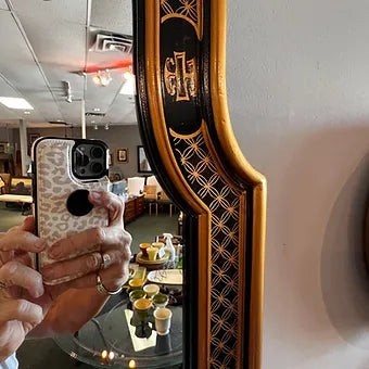 Grand Expressions Gallery and Home Store Drexel Chinoiserie mirror with black and gold hand-painted Asian patterns.