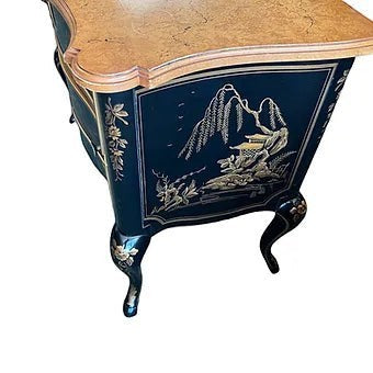 Grand Expressions Gallery and Home Store Drexel Chinoiserie chest with black and gold hand-painted Asian scenery.