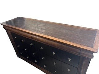 Grand Expressions Gallery and Home Store Drexel Heritage dresser with dark brown wood finish and star-shaped hardware.