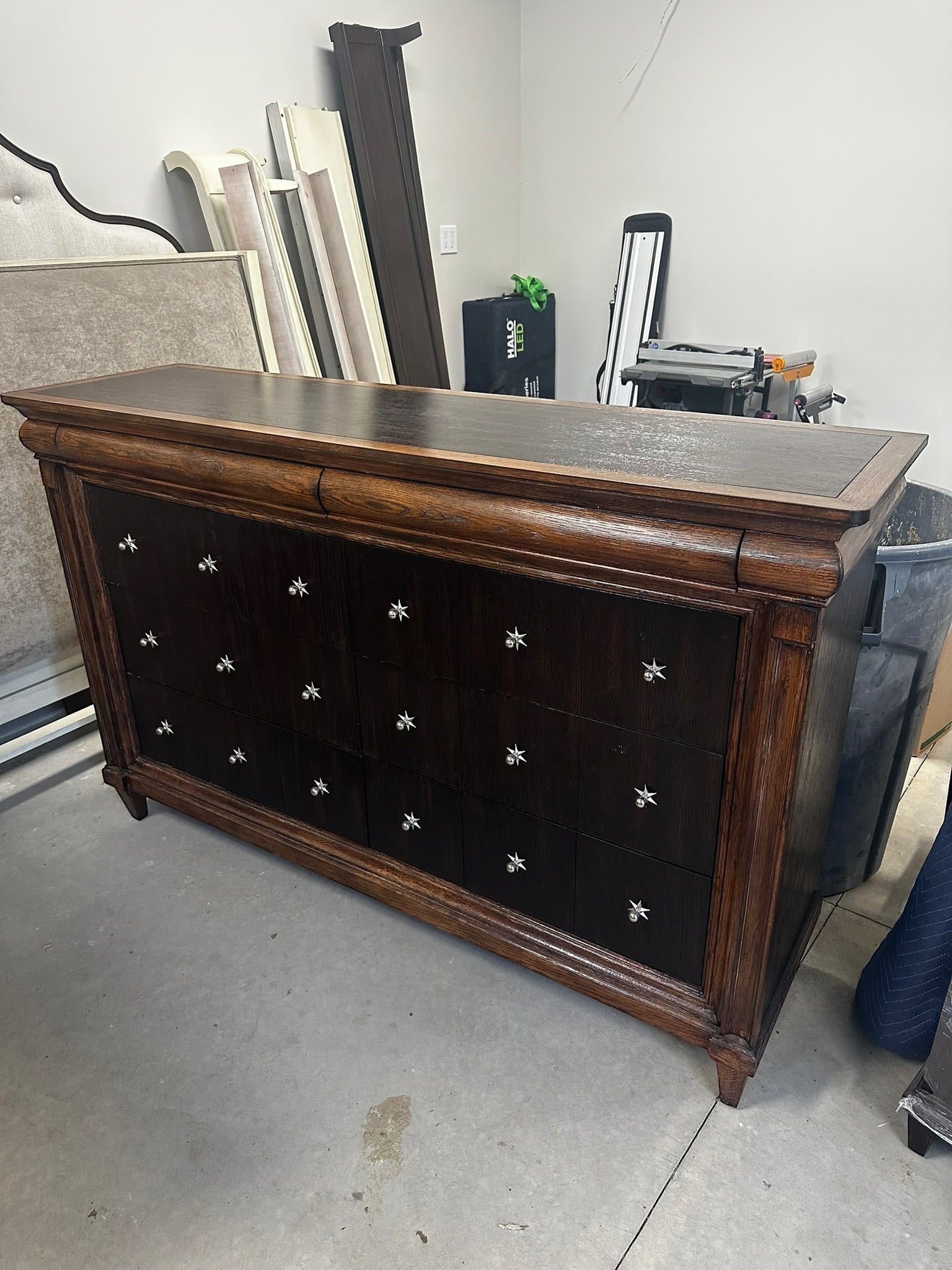Grand Expressions Gallery and Home Store Drexel Heritage dresser with dark brown finish and unique star hardware.