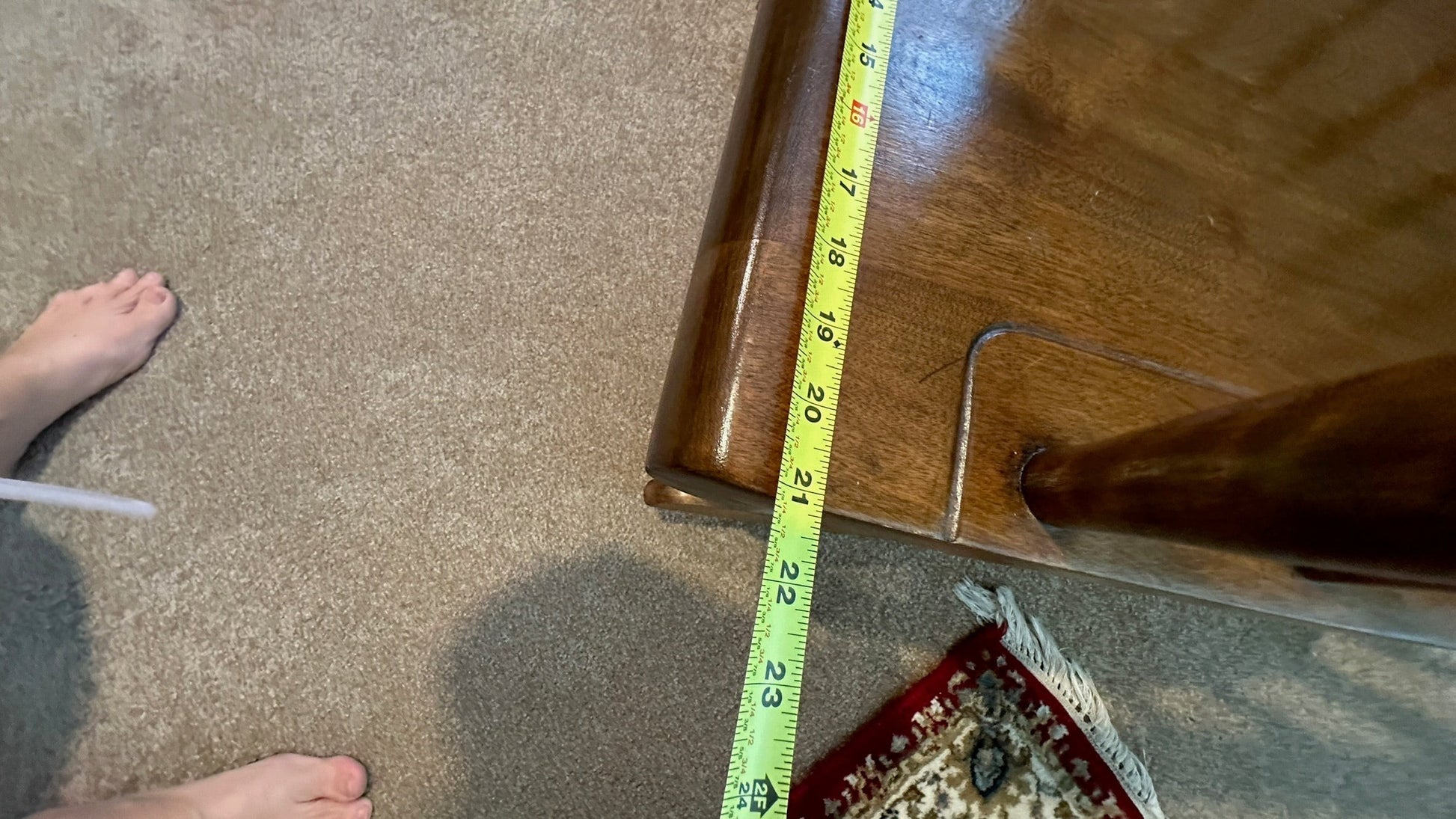 Vintage Ethan Allen wood rocking chair from Grand Expressions Gallery and Home Store showing depth measurements.