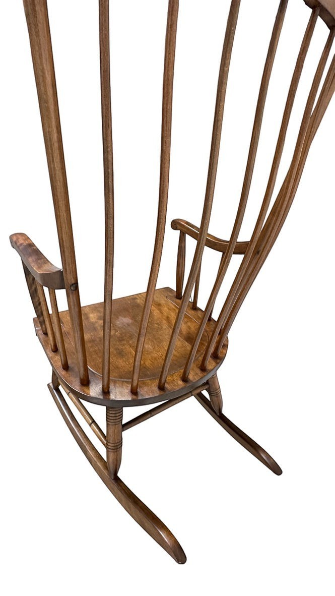 Vintage Ethan Allen wood rocking chair with a high spindle back, sold by Grand Expressions Gallery and Home Store.