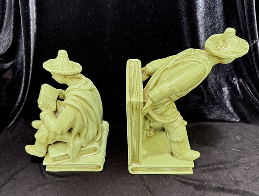 Grand Expressions Gallery and Home Store vintage Italian Asian figurine bookends with a green crackle glaze finish.