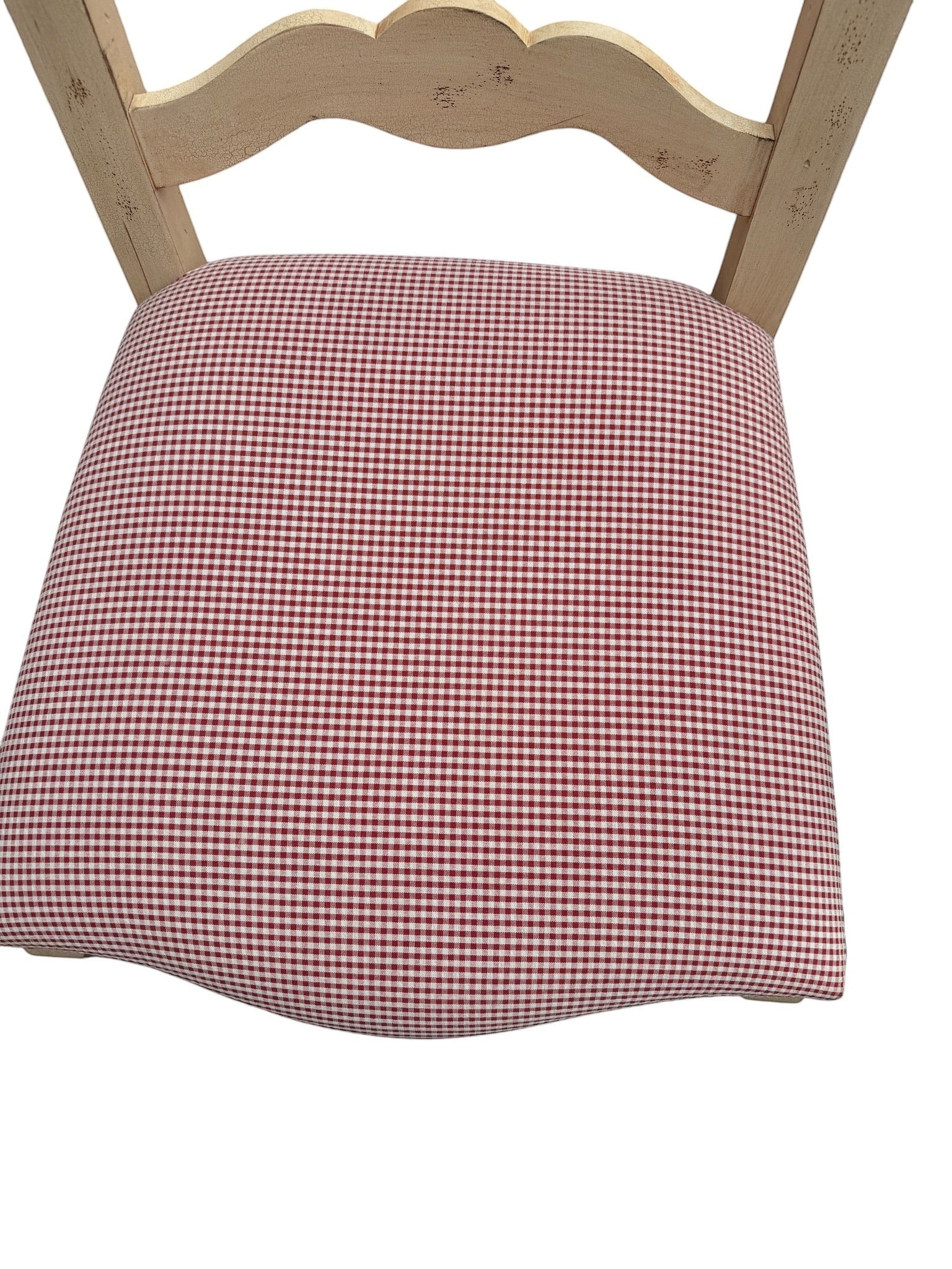 Grand Expressions Gallery and Home Store Century Furniture ladder-back dining chair with red and white gingham seat.