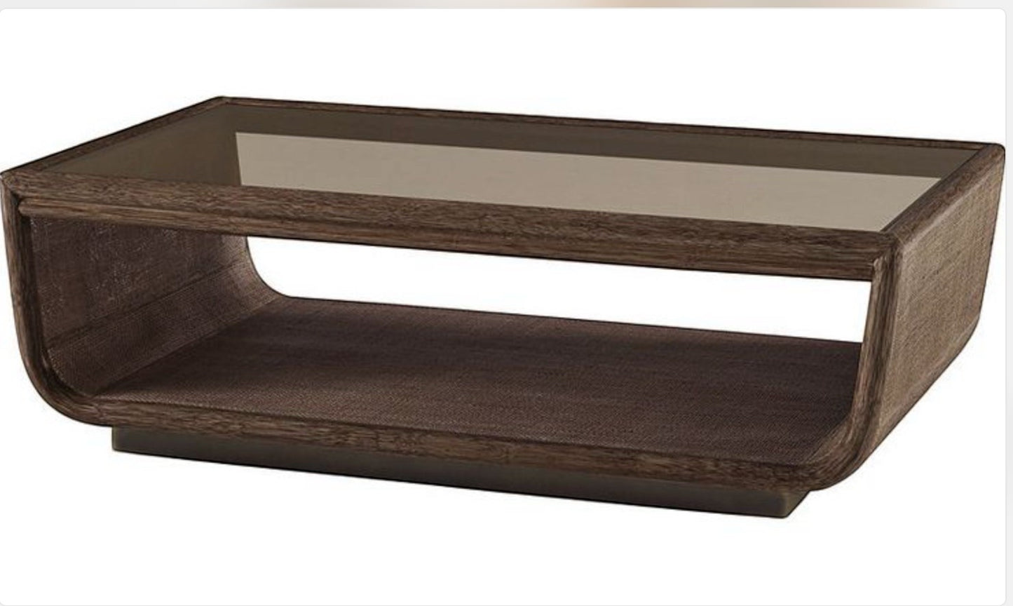 Grand Expressions Gallery and Home Store McGuire Ladera coffee table with a sculpted wood base and glass top.