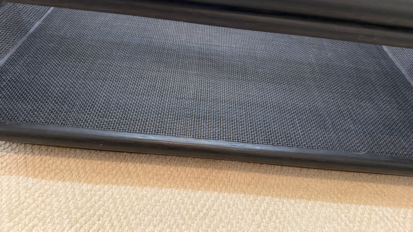 Close-up of the black woven mesh shelf on the Ladera Coffee Table #863 by McGuire at Grand Expressions Gallery and Home Store