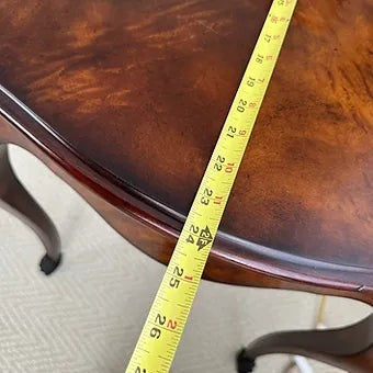 Grand Expressions Gallery and Home Store Theadore Alexander Louis XV side table with wood grain and measuring tape.
