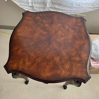 Grand Expressions Gallery and Home Store Louis XV side table with a rich wood grain top and elegant cabriole legs.