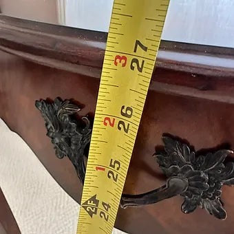 Grand Expressions Gallery and Home Store Louis XV side table with dark wood finish and ornate brass drawer pulls.