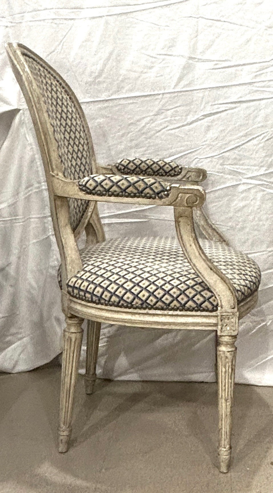 Grand Expressions Gallery and Home Store Louis XVI fauteuil with blue and cream needlepoint and painted beechwood.