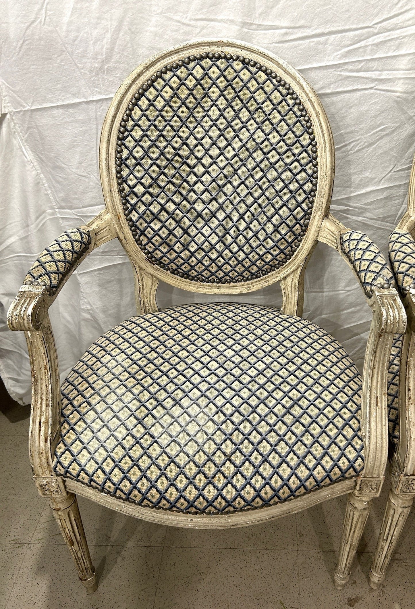 Grand Expressions Gallery and Home Store pair of Louis XVI fauteuils with blue and cream needlepoint diamond upholstery