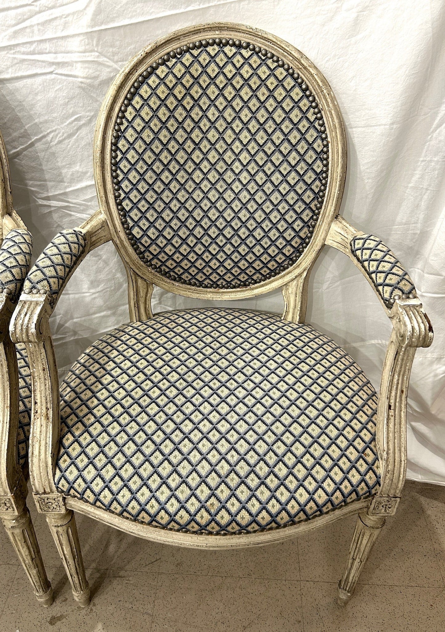 Grand Expressions Gallery and Home Store pair of Louis XVI fauteuils with blue and cream needlepoint diamond upholstery
