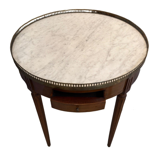 Grand Expressions Gallery and Home Store 18th-century Louis XVI tea table with white marble top and brass gallery.