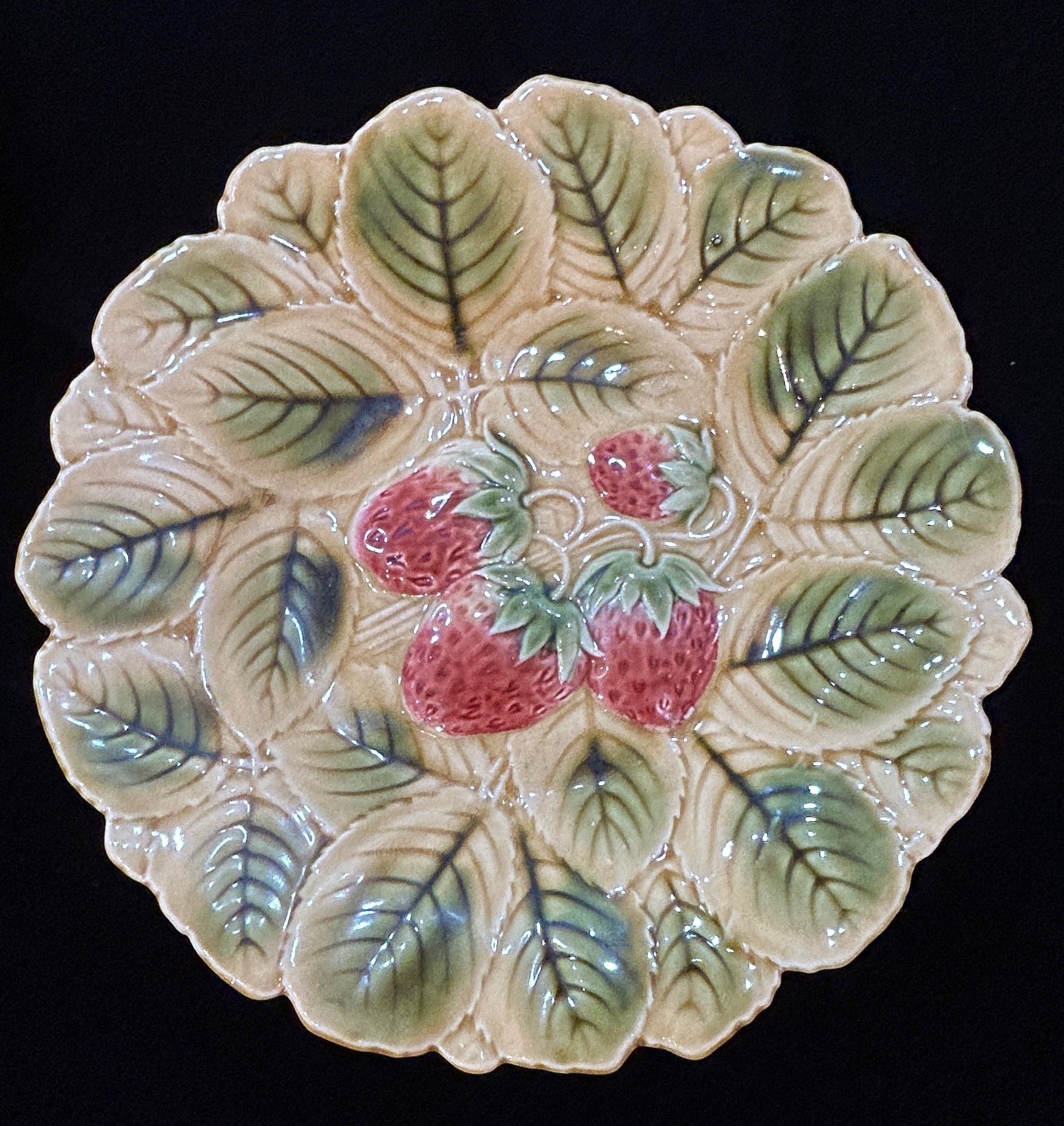 Grand Expressions Gallery and Home Store antique Sarreguemines French majolica plate with embossed strawberry motif.