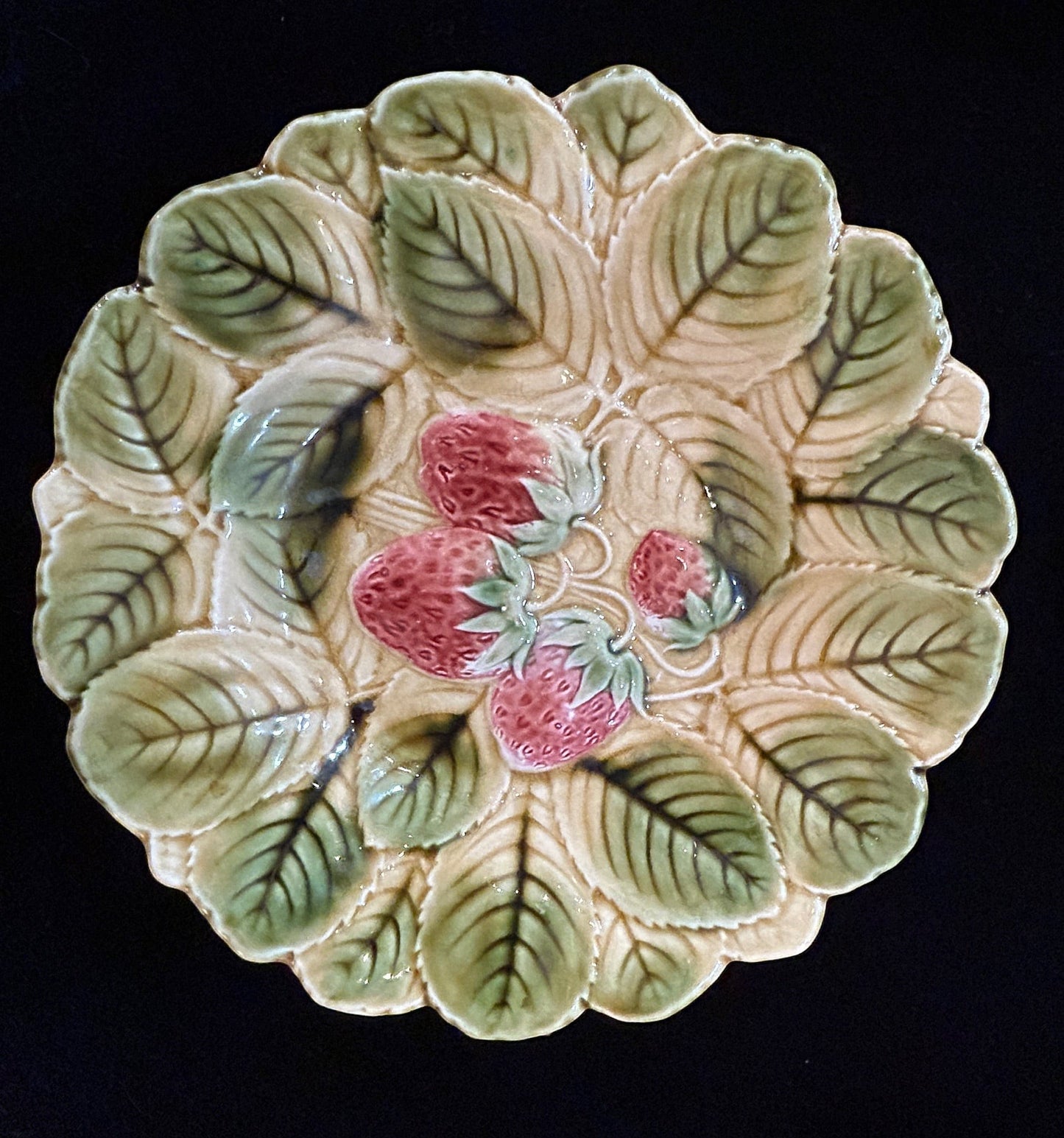Grand Expressions Gallery and Home Store antique Sarreguemines French majolica plate with embossed strawberry motif.