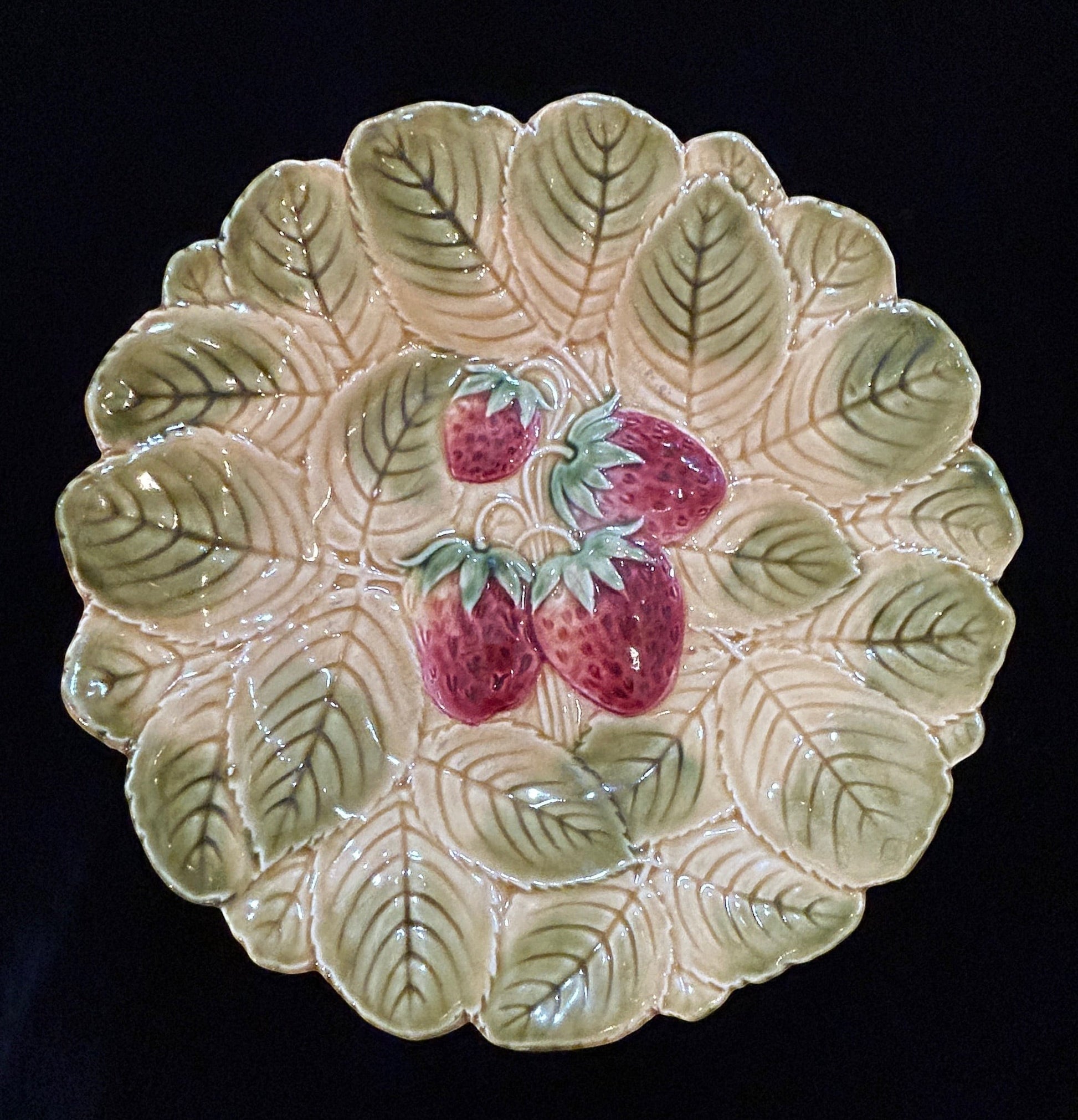 Grand Expressions Gallery and Home Store antique Sarreguemines majolica plate with embossed strawberry and leaf motif.