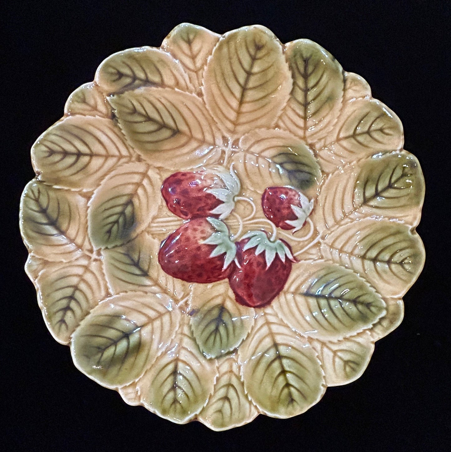 Grand Expressions Gallery and Home Store antique Sarreguemines majolica plate with embossed strawberry and leaf motif.