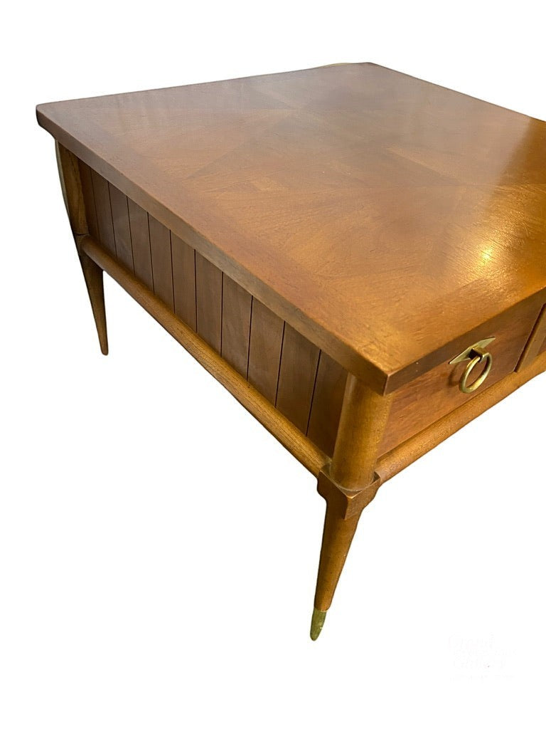 Grand Expressions Gallery and Home Store American of Martinville MCM wood accent table with brass ring pull and feet.