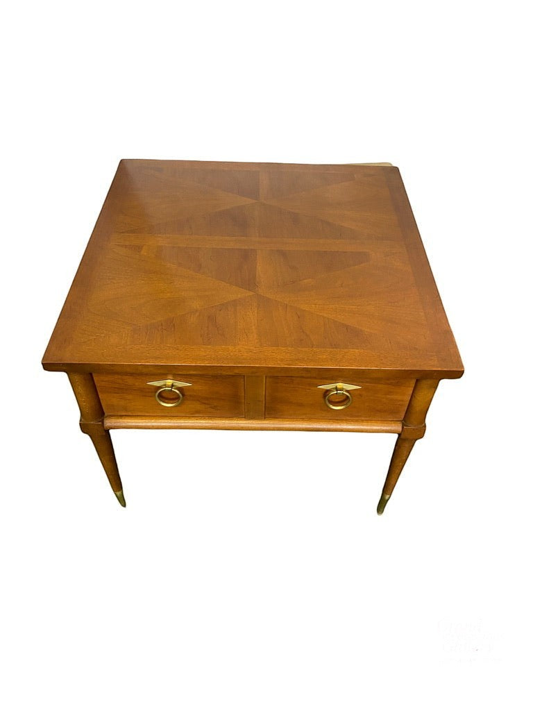 Grand Expressions Gallery and Home Store MCM accent table in wood with brass ring pulls and tapered legs.