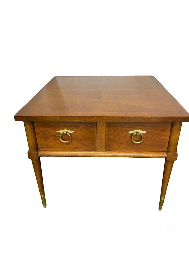 Grand Expressions Gallery and Home Store MCM accent table in wood with two drawers, brass ring pulls, and tapered legs.