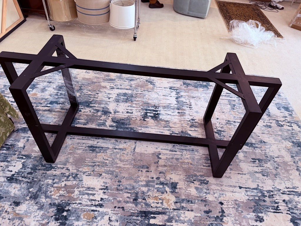 Grand Expressions Gallery and Home Store black metal X-frame dining table base for a natural slab wood table.