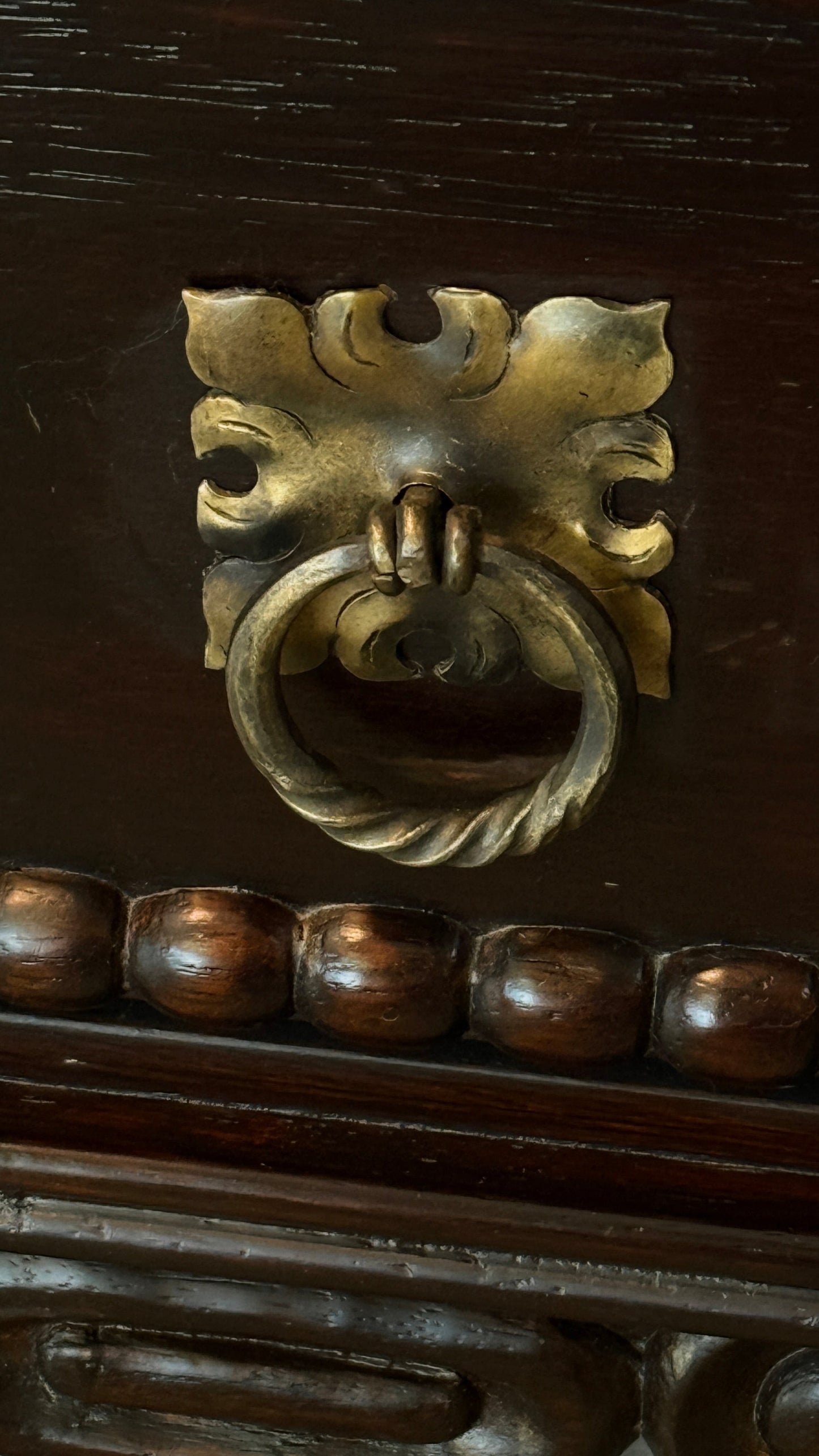 Grand Expressions Gallery and Home Store Mission buffet drawer featuring an ornate antique-style brass ring pull.