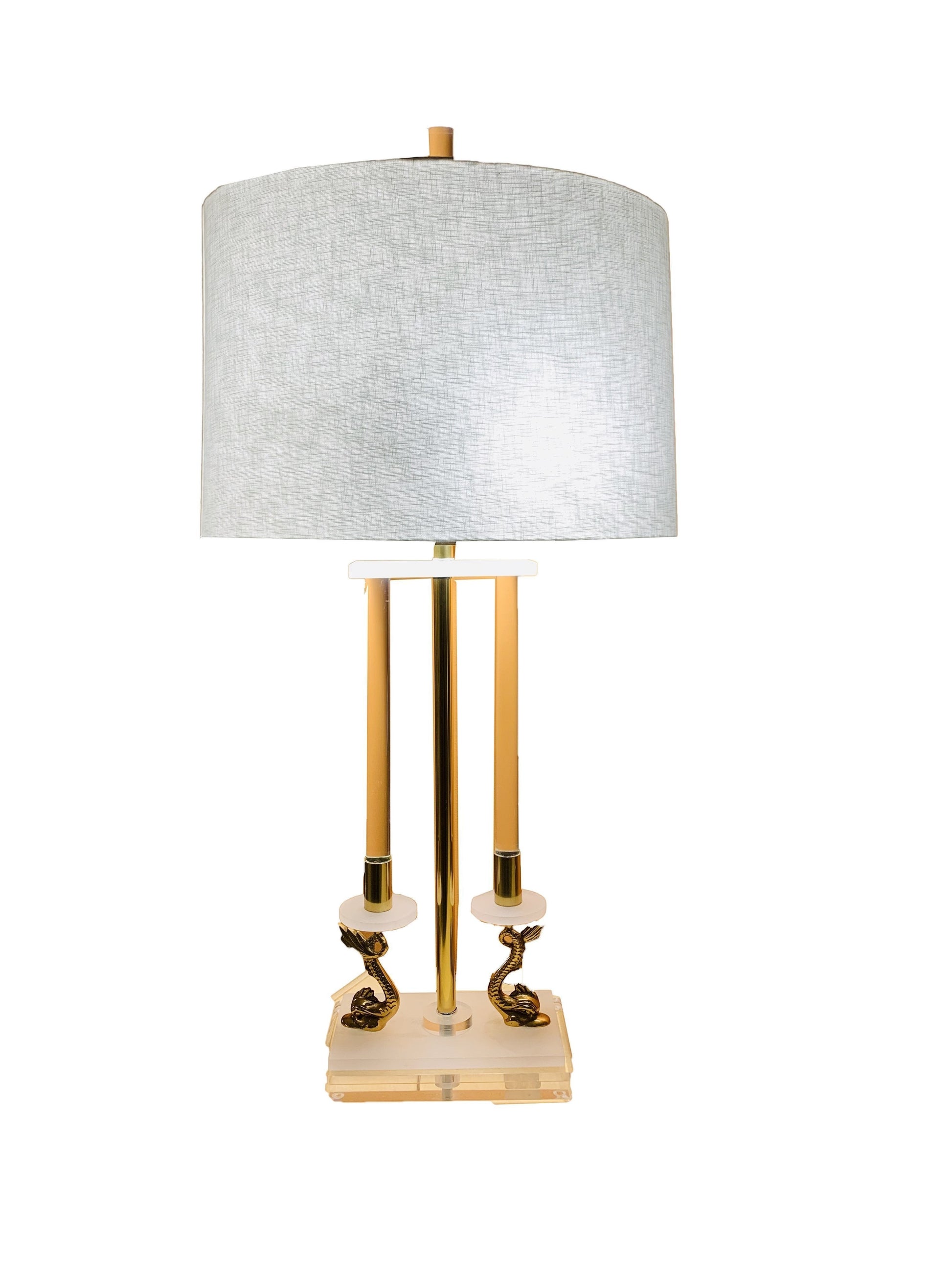 Grand Expressions Gallery and Home Store neoclassical lamp with brass koi fish, lucite base, and linen shade.