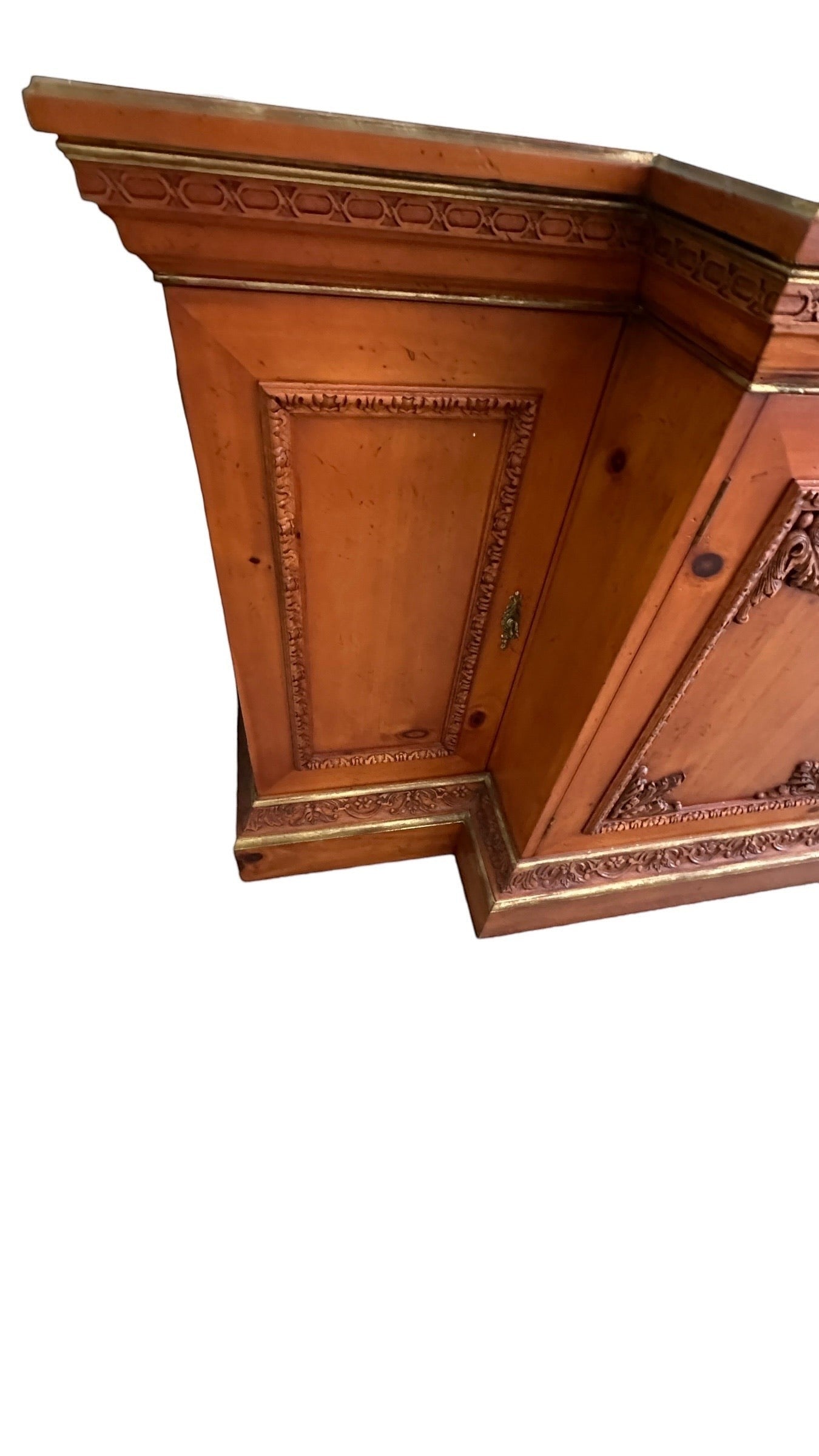 Grand Expressions Gallery and Home Store ornate wooden credenza with intricate carvings and gold-toned accents.